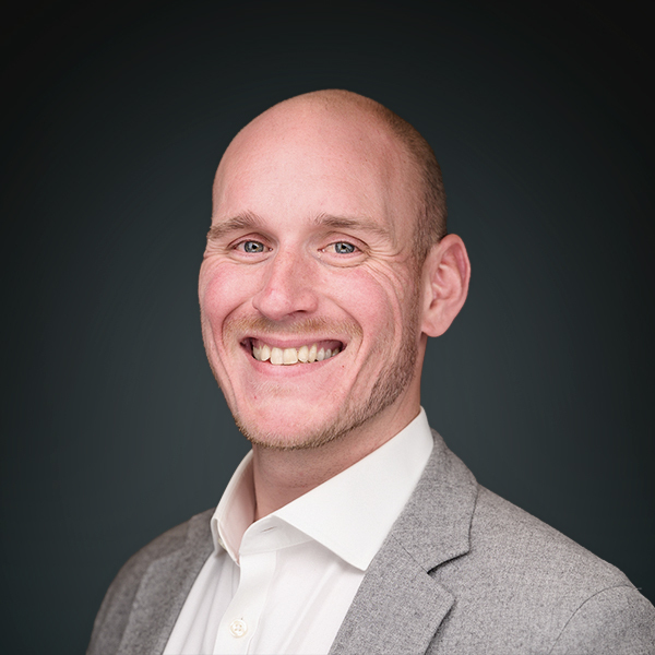 A photo of Alex McLaughlin, Chief AI and Product Officer