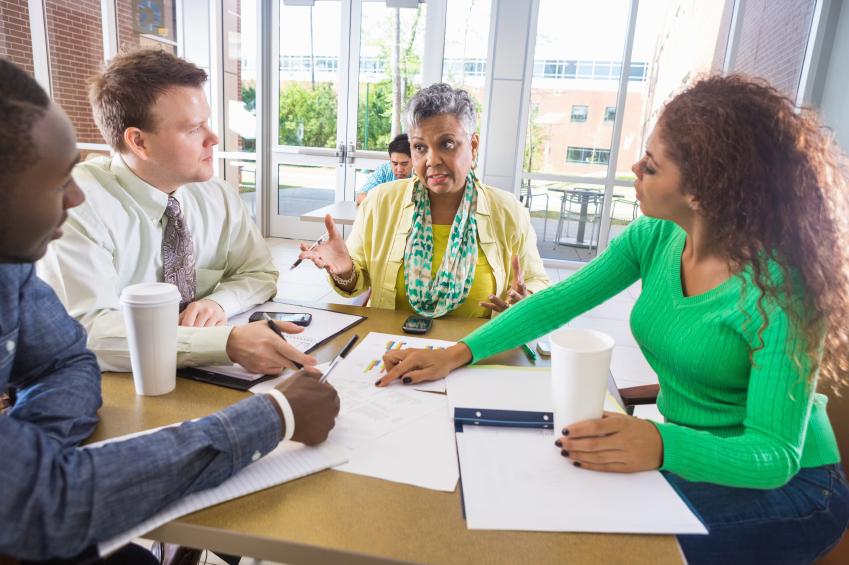 A group of organizers discussing their next fundraising event