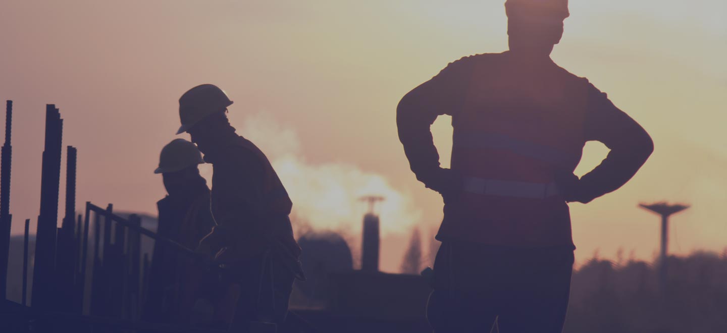 A group of construction workers out on a site