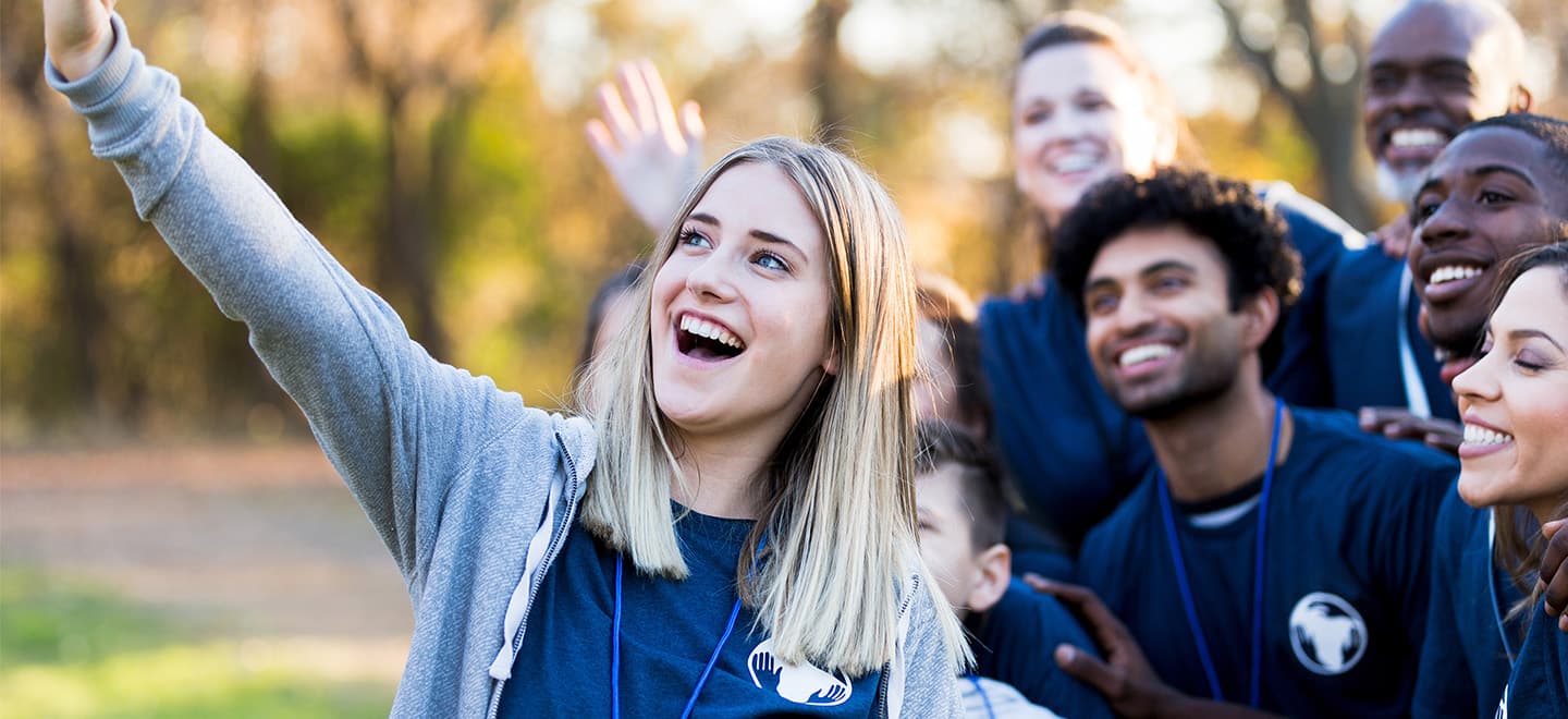 A group of young volunteers posing for a selfie